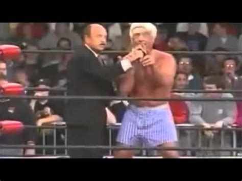 ric flair throws a pair of gucci shoes at wrestling crowd